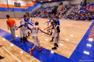 Trent Nelson  |  The Salt Lake Tribune
Water Canyon School's Mario Barlow is introduced as the team prepares to face Escalante in the first high school basketball game in the school's a gym, which used to be the FLDS bishop's storehouse, in Hildale, Wednesday December 2, 2015.