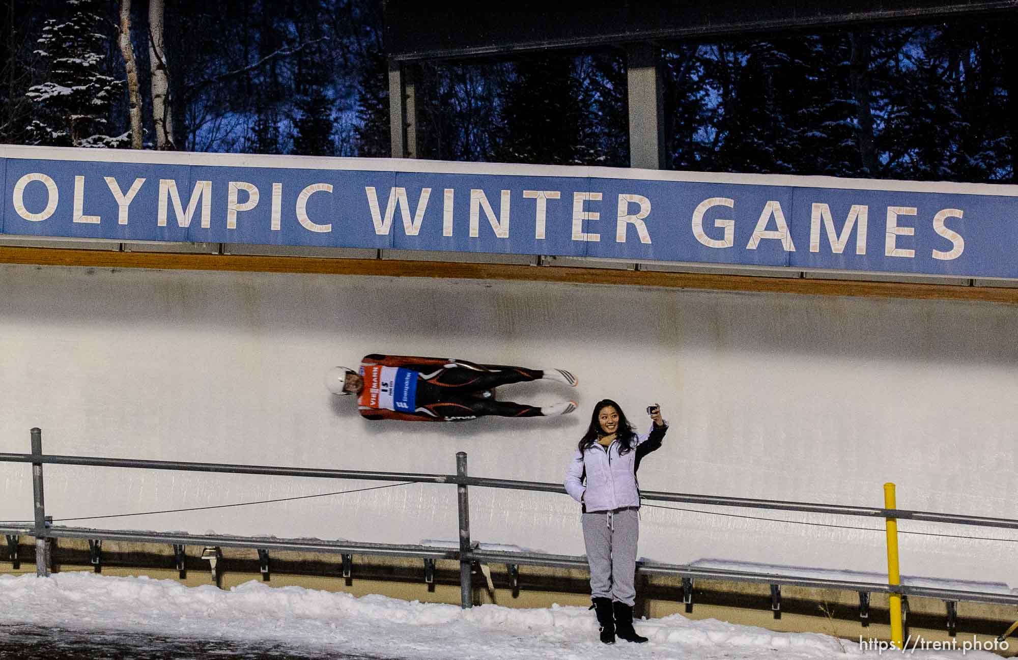 Trent Nelson  |  The Salt Lake Tribune
A fan takes a selfie as Latvia's Inars Kivienieks slides by, competing in the Viessmann Luge World Cup at the Utah Olympic Park, Saturday December 12, 2015.