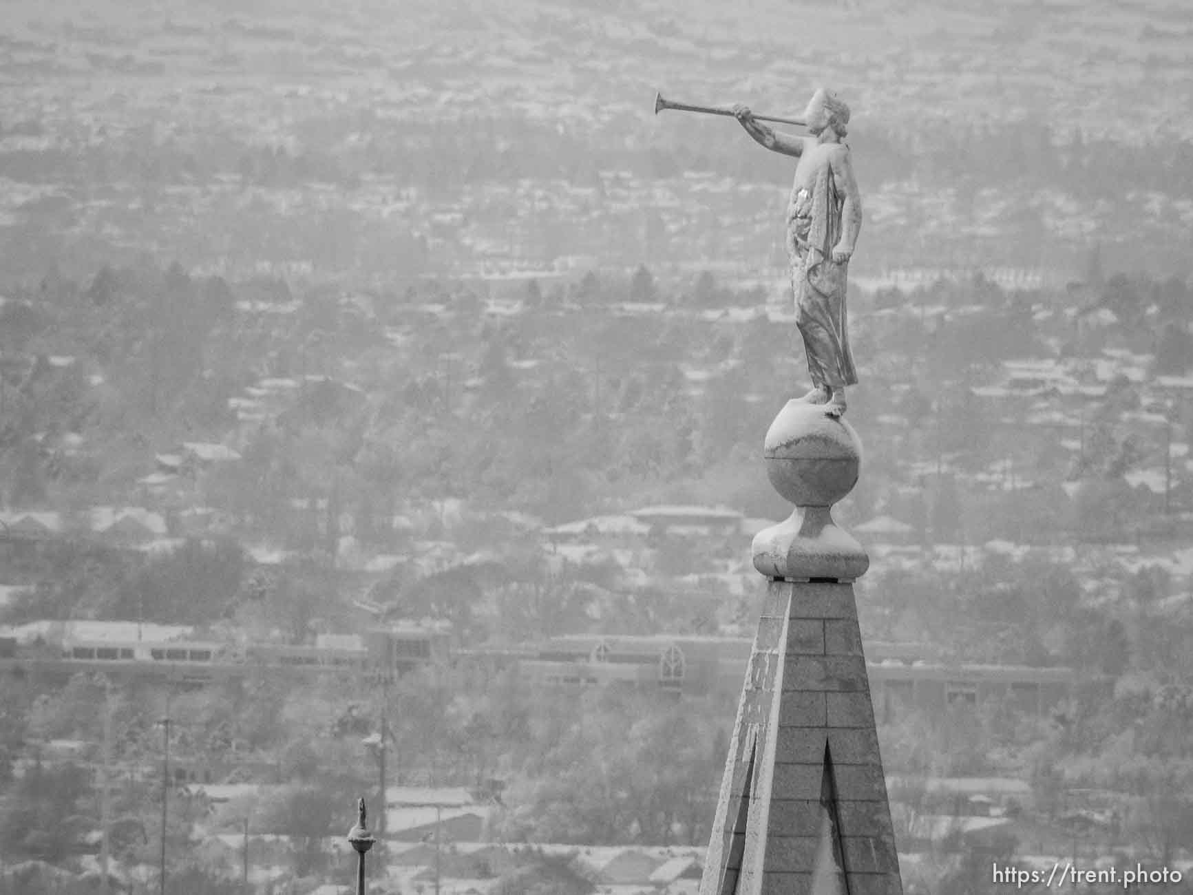 Trent Nelson  |  The Salt Lake Tribune
moroni on lds temple, Snowfall in Salt Lake City, Tuesday December 15, 2015.