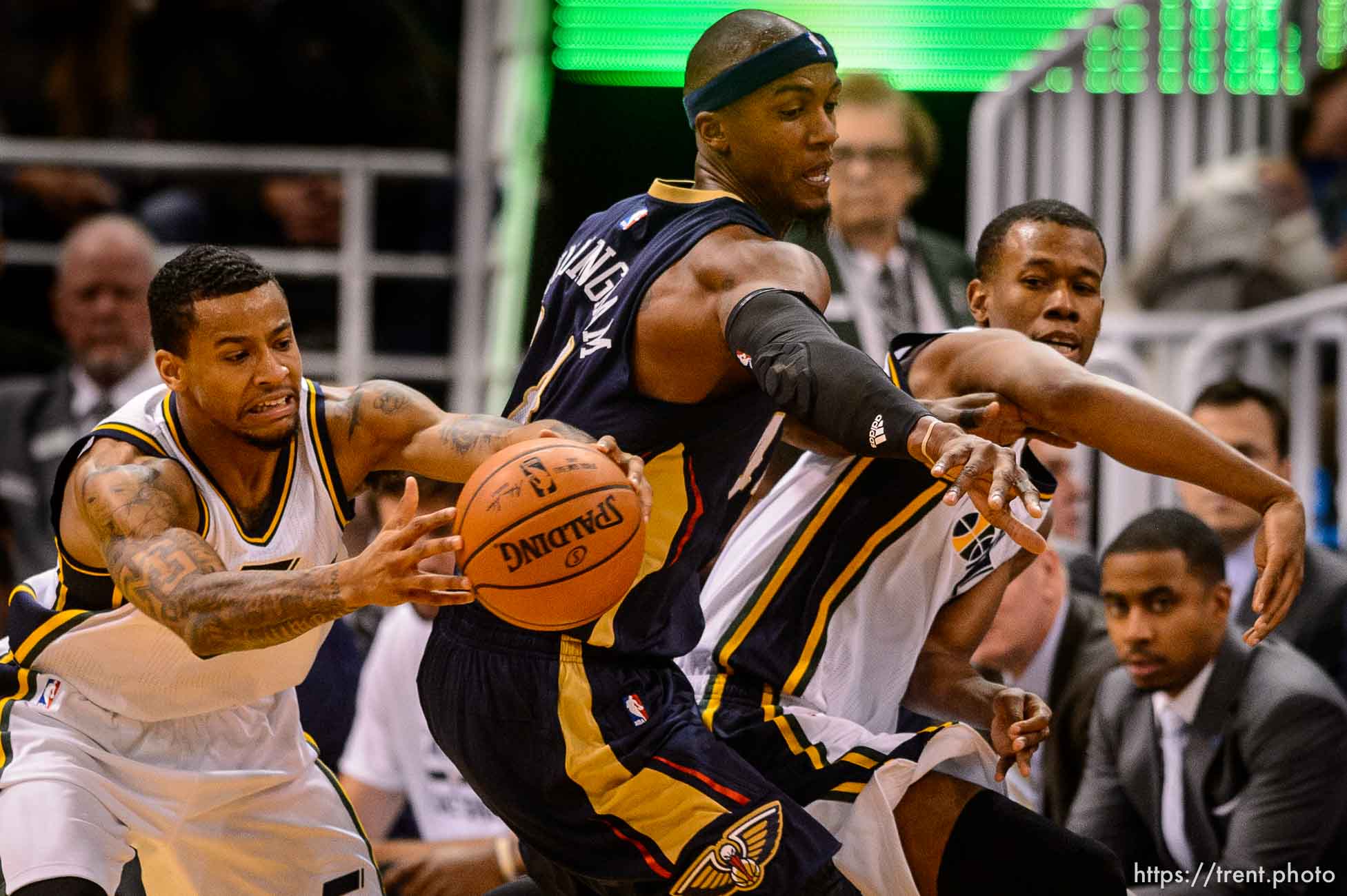 Trent Nelson  |  The Salt Lake Tribune
Utah Jazz guard Trey Burke (3), New Orleans Pelicans forward Dante Cunningham (44) and Utah Jazz guard Rodney Hood (5) reach for a loose ball as the Utah Jazz host the New Orleans Pelicans, NBA basketball in Salt Lake City, Wednesday December 16, 2015.