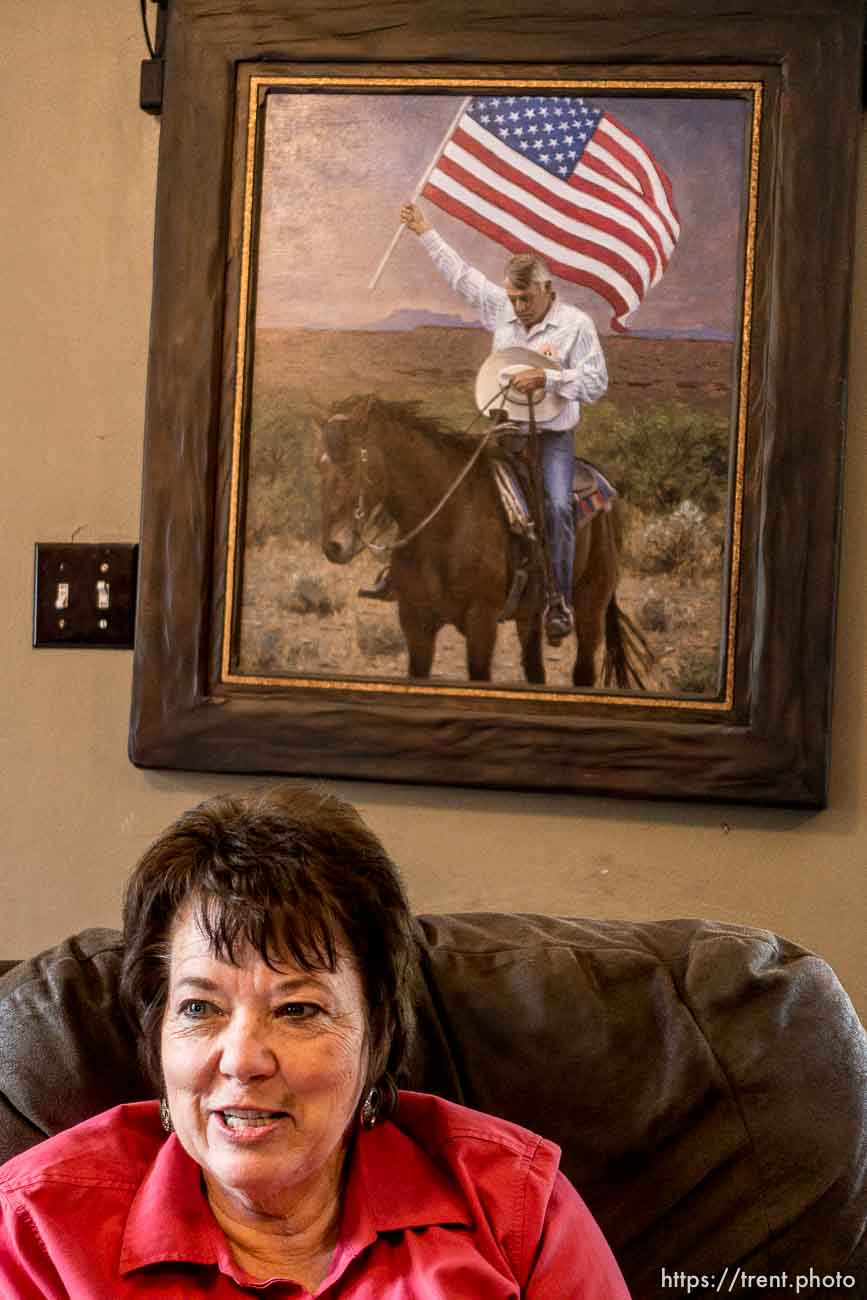 Trent Nelson  |  The Salt Lake Tribune
Carol Bundy in the front room of the family's ranch home in Bunkerville, NV, Thursday April 14, 2016. A painting of her husband, Cliven Bundy, holding an American flag on horseback, hangs behind her.