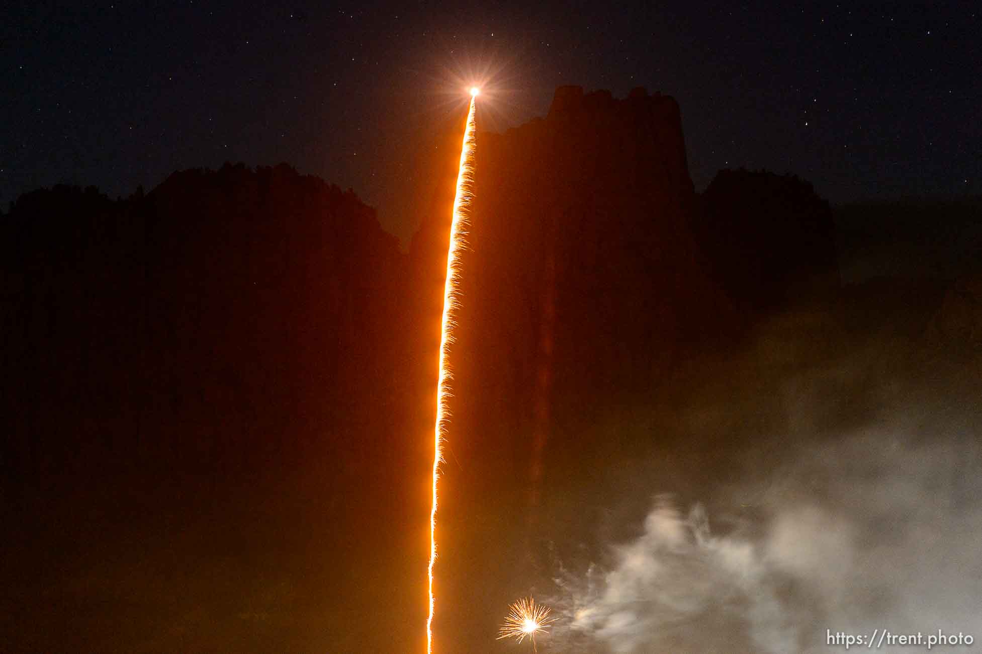 Trent Nelson  |  The Salt Lake Tribune
Fireworks light up the Vermillion Cliffs and Hildale, UT, and Colorado City, AZ during an Independence Day celebration, Saturday July 2, 2016.