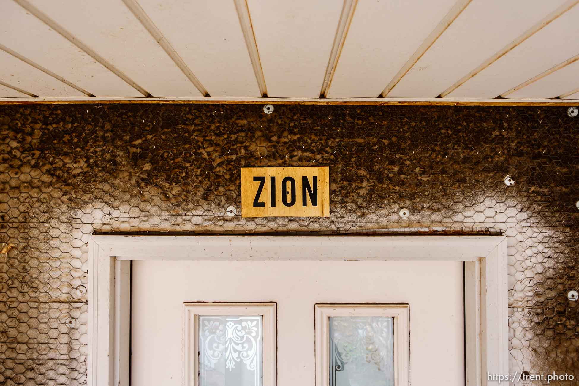 Trent Nelson  |  The Salt Lake Tribune
A sign reading Zion over the front door of a Hildale home owned by the United Effort Plan trust that Shawn and Alexandra Stubbs hope to move into, Saturday February 11, 2017. The signs are put on homes occupied by members of the FLDS church.