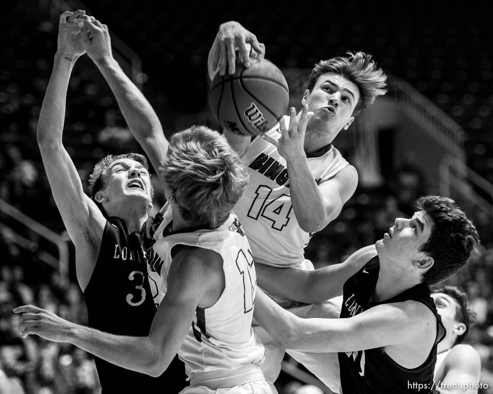 Trent Nelson  |  The Salt Lake Tribune
Bingham's Brayden Cosper (14) pulls down a rebound as Bingham faces Lone Peak in the 5A state high school basketball championship game, Saturday March 4, 2017.