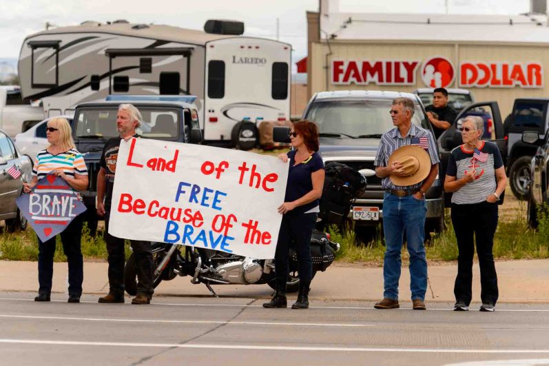 (Trent Nelson | The Salt Lake Tribune)  Crowds line Main Street in Monticello to honor the motorcade of fallen soldier Aaron Butler, who was killed last week in Afghanistan, , Thursday August 24, 2017.