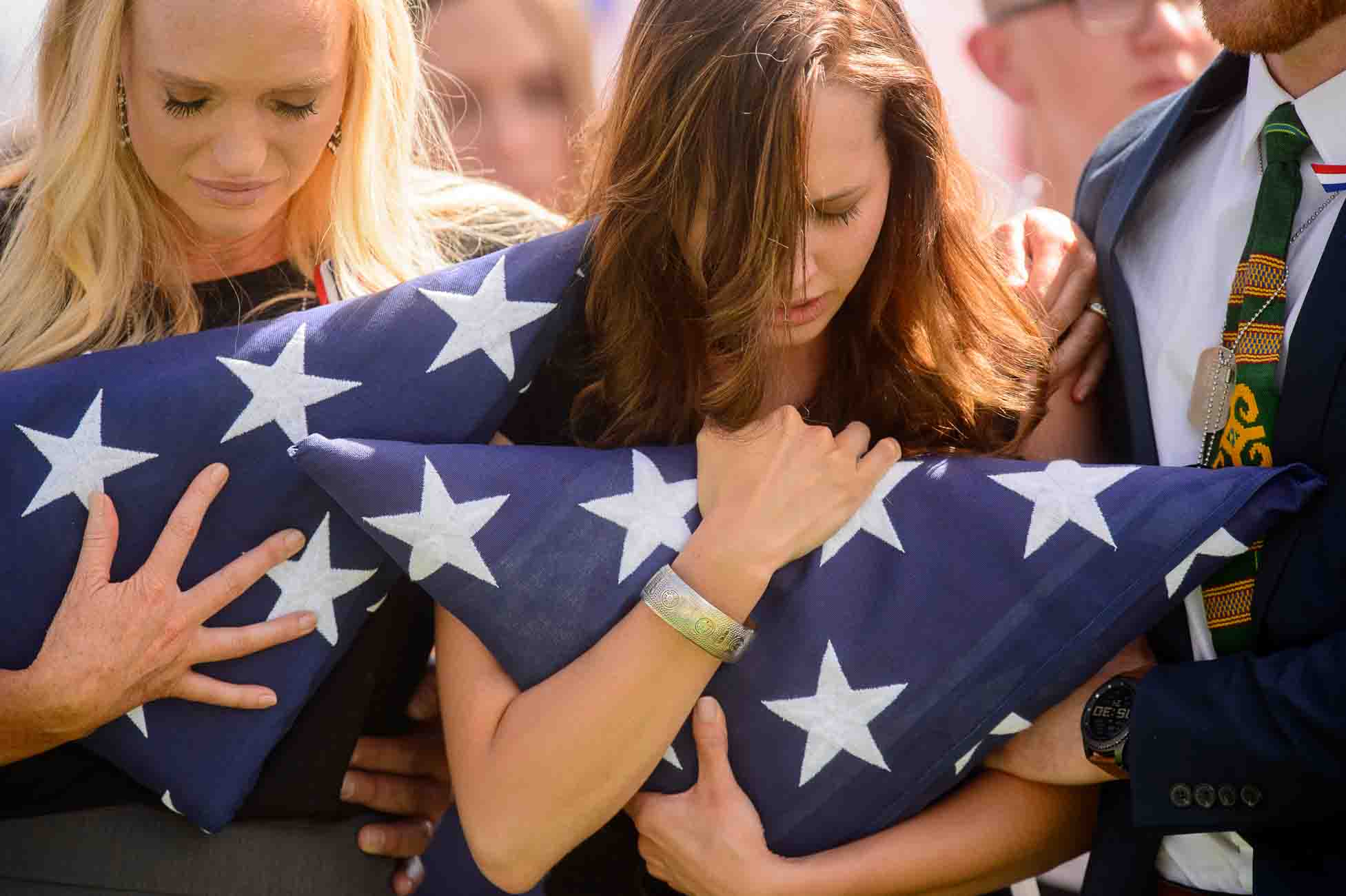 (Trent Nelson | The Salt Lake Tribune)  Shannon Young (sister) and Alexandria Seagroves (fiancé) at the graveside service for fallen soldier Aaron Butler, in Monticello Saturday August 26, 2017.