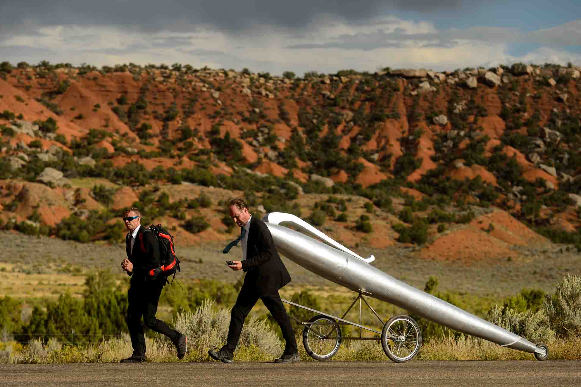 (Trent Nelson | The Salt Lake Tribune)  German artists Wolfgang Aichner and Thomas Huber on the first day of their art project, Linear, about ten miles northwest of Vernal Wednesday September 13, 2017. The duo are launching a four-week long performance art project in which they are filming themselves dragging an oversized giant silver pen through a 250-mile rectangular through the deserts of Utah, Wyoming and Colorado.