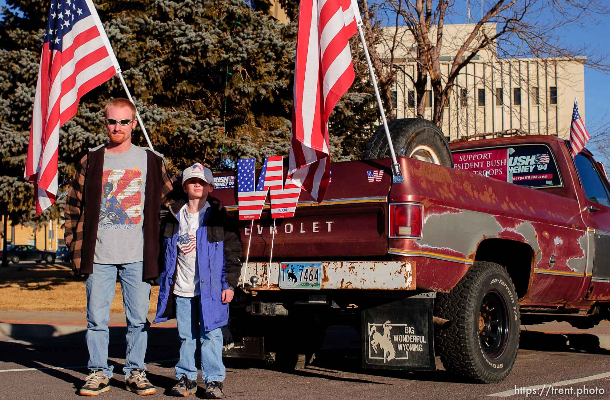 Casper - pickup truck covered with american flags. 