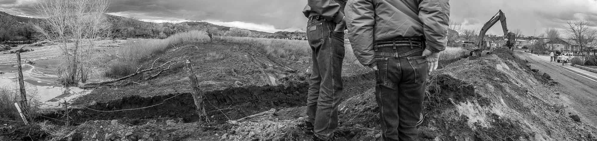 Utah Governor Jon M Huntsman, Jr., on the banks of the Santa Clara River, while touring the flood in southern utah