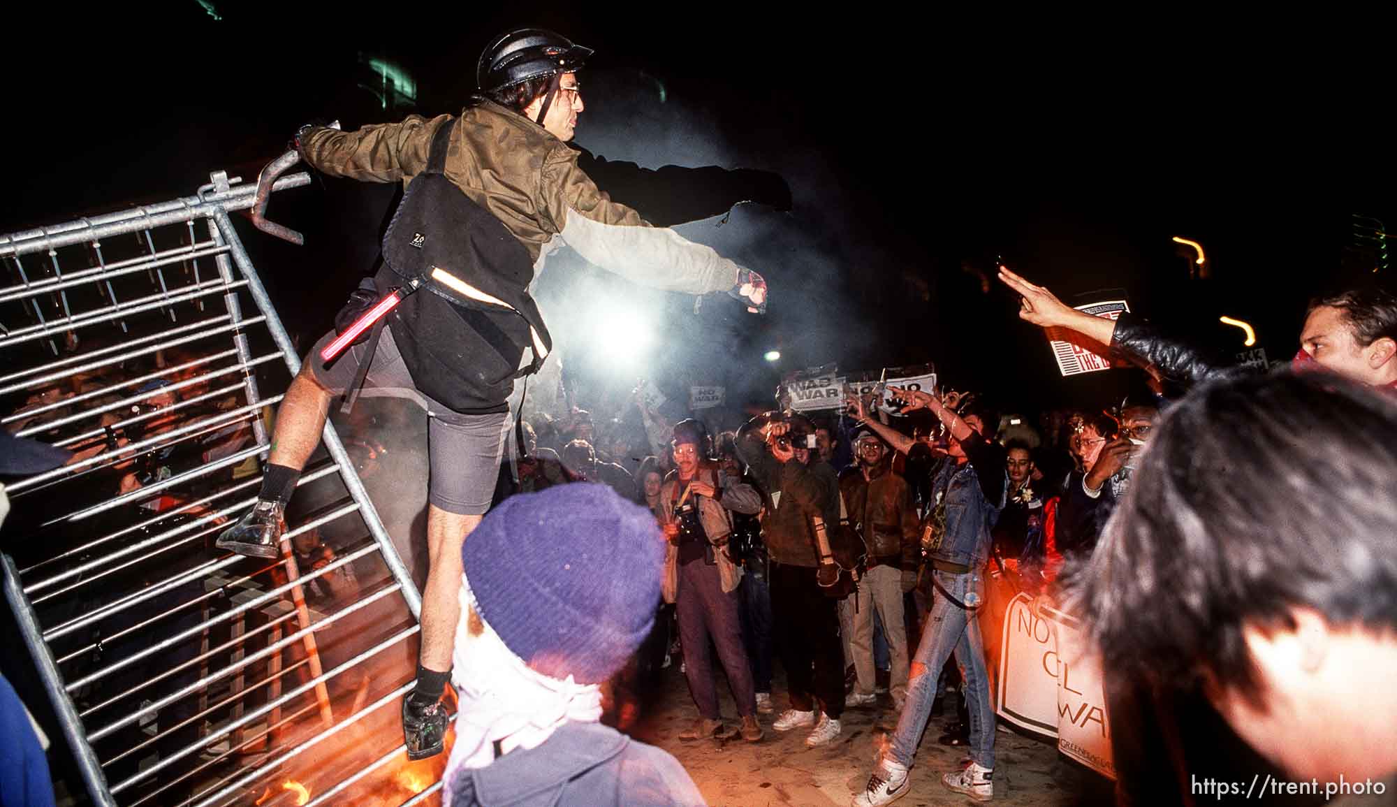 Protesters attack police barricades at the Federal Building during an anti-war Gulf War protest.