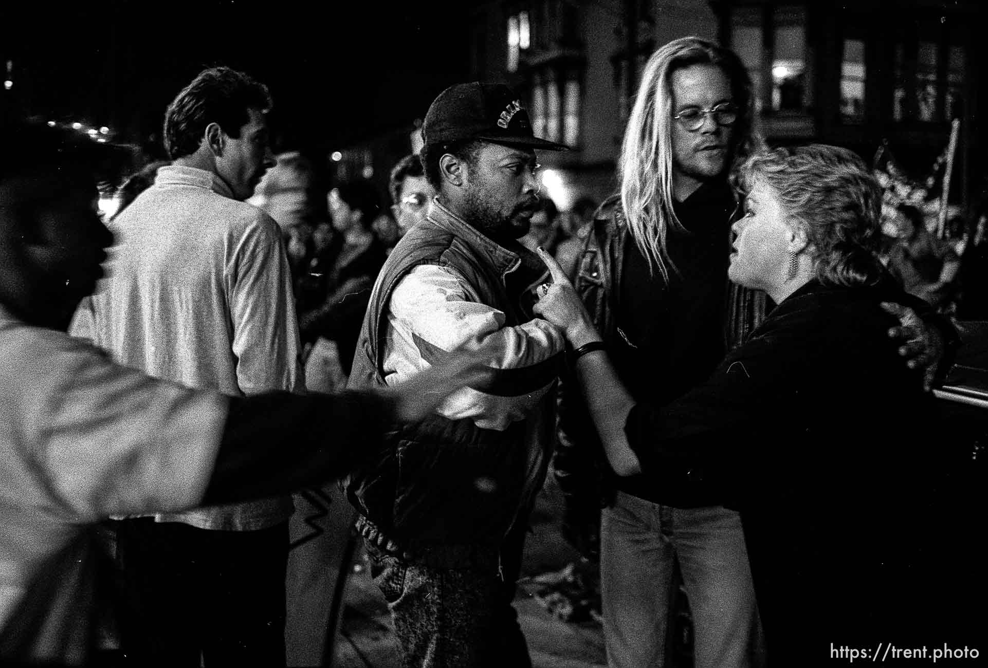 Protesters confront woman who threw eggs at them at Gulf War protest.