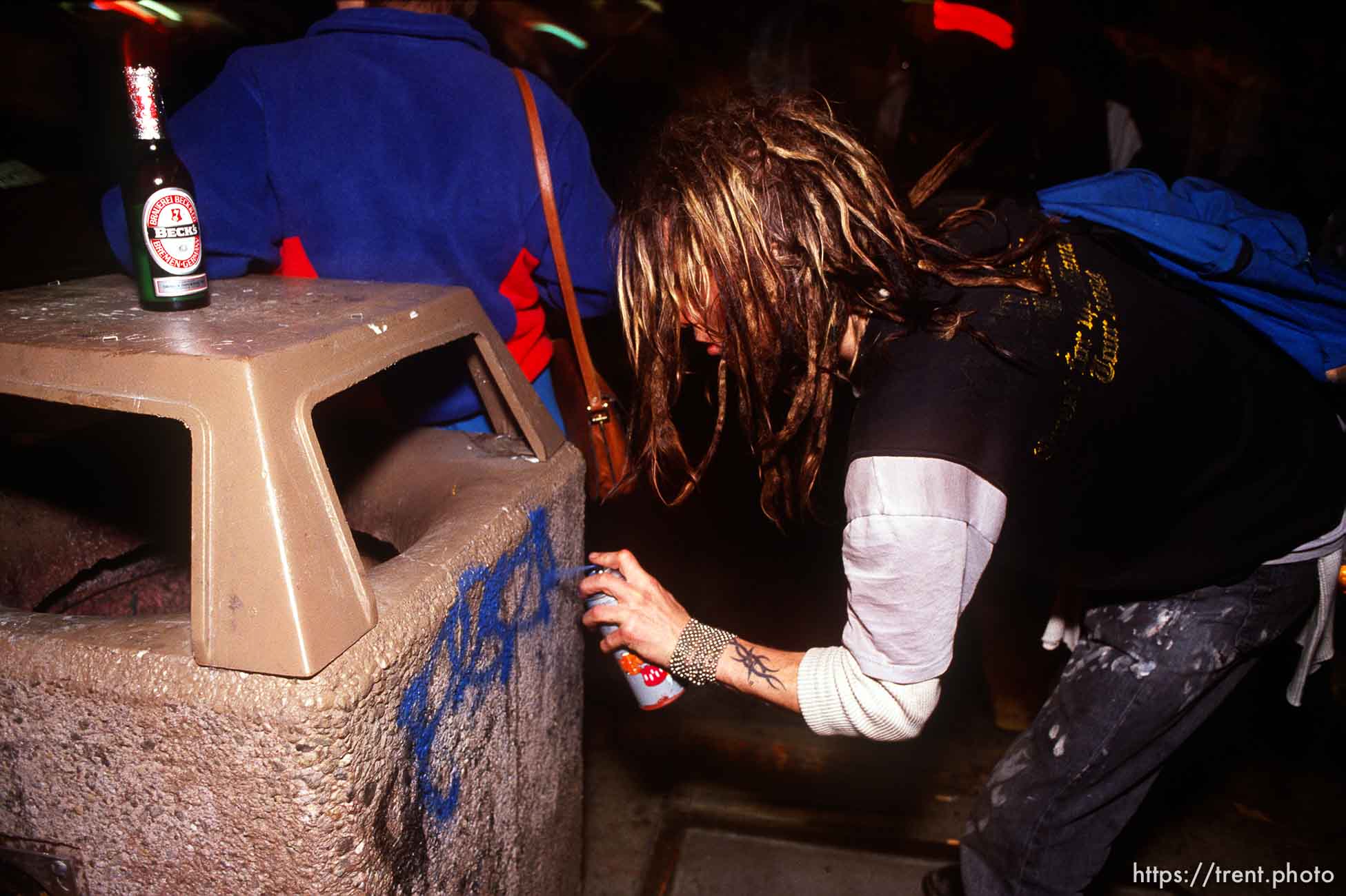 Spray painting a garbage can during Anti war Gulf War protests.