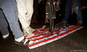 Desecrating the U.S. flag at Anti war Gulf War protests.