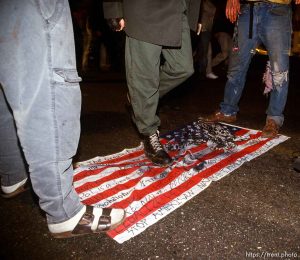 Desecrating the U.S. flage at Anti war Gulf War protests.