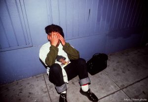 Kid crying after a lady threw eggs at the war protest parade he thought he was leading. Anti war Gulf War protests.