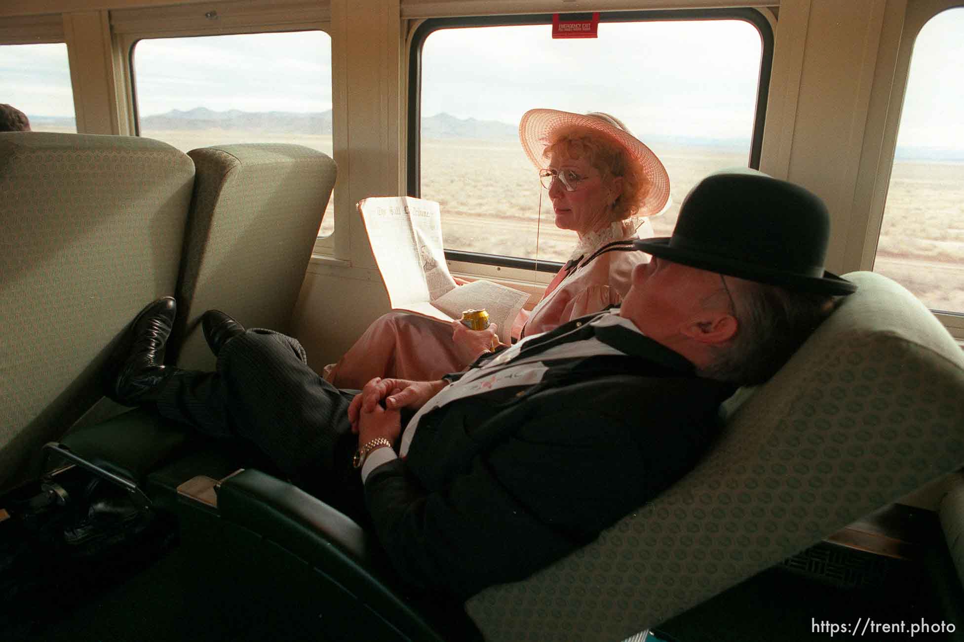 People in period costume ride the Governor's Centennial Train