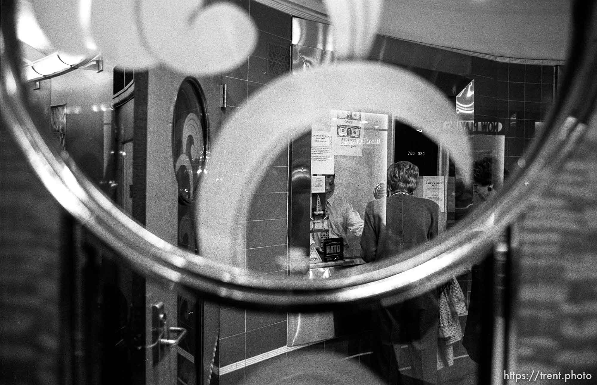 People buying tickets at the Orinda Theater.