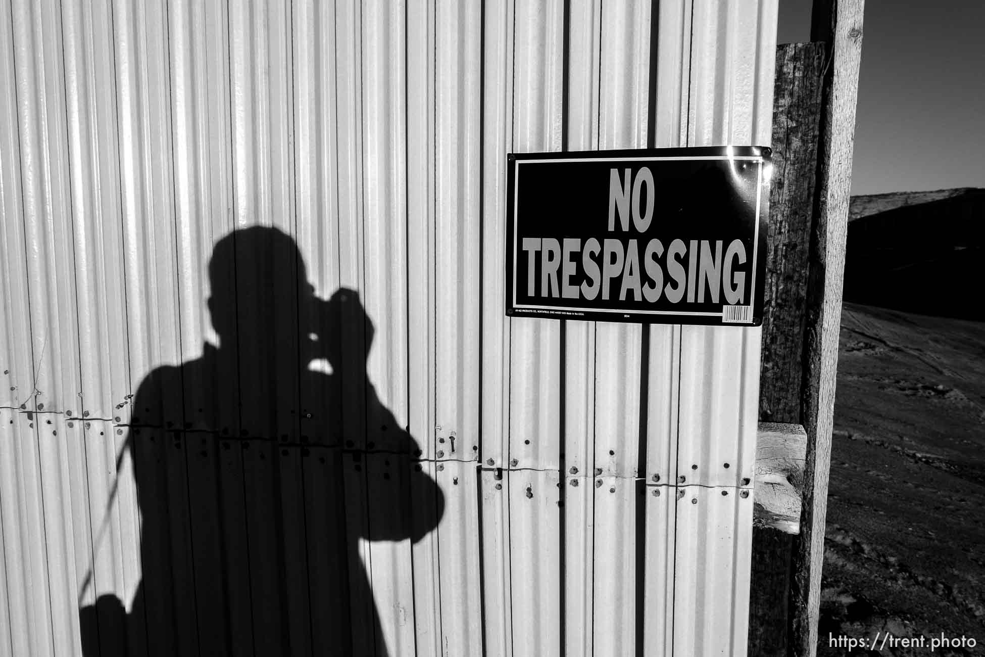 Trent Nelson  |  The Salt Lake Tribune
trent shadow and wall around apparent new FLDS storehouse, Hildale, Wednesday January 14, 2015.