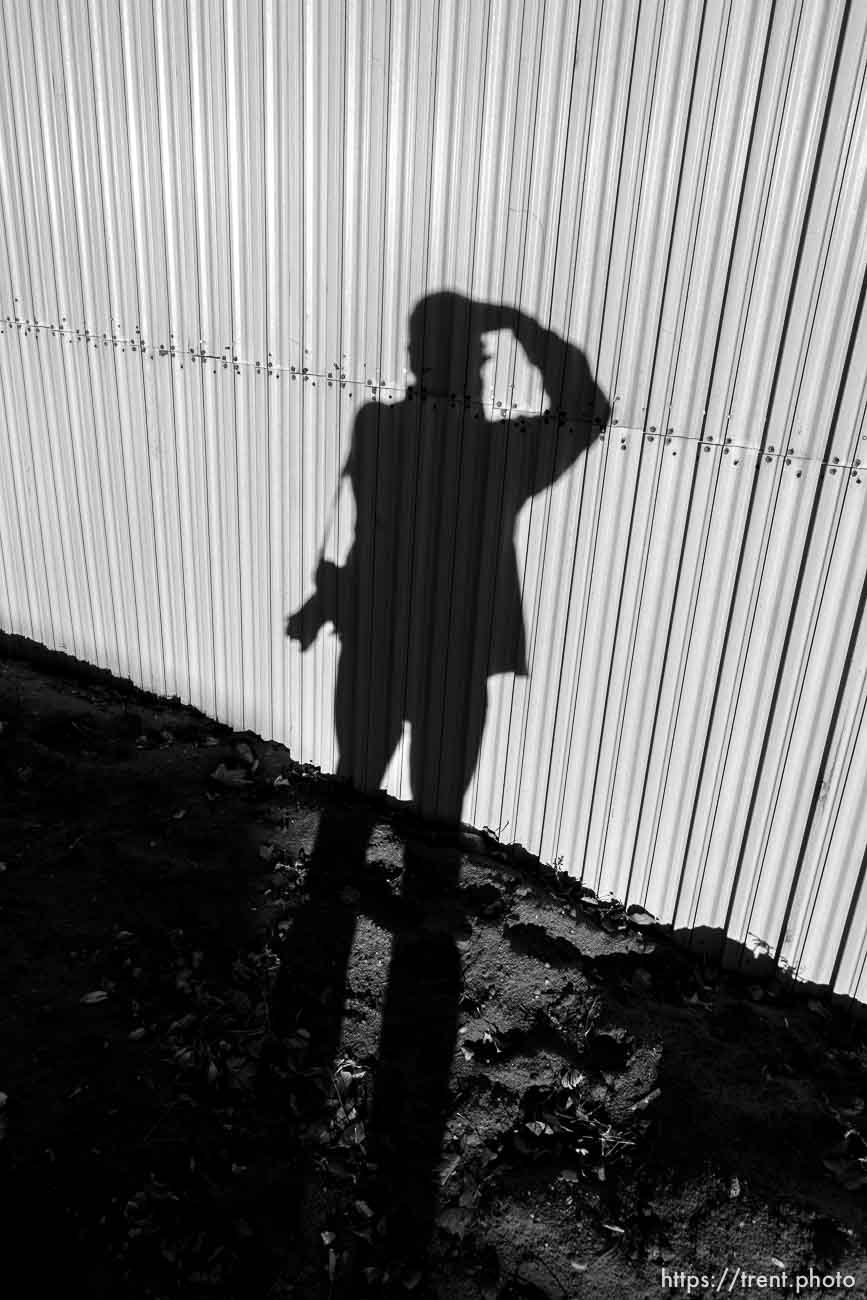 Trent Nelson  |  The Salt Lake Tribune
trent shadow and wall around apparent new FLDS storehouse, Hildale, Wednesday January 14, 2015.