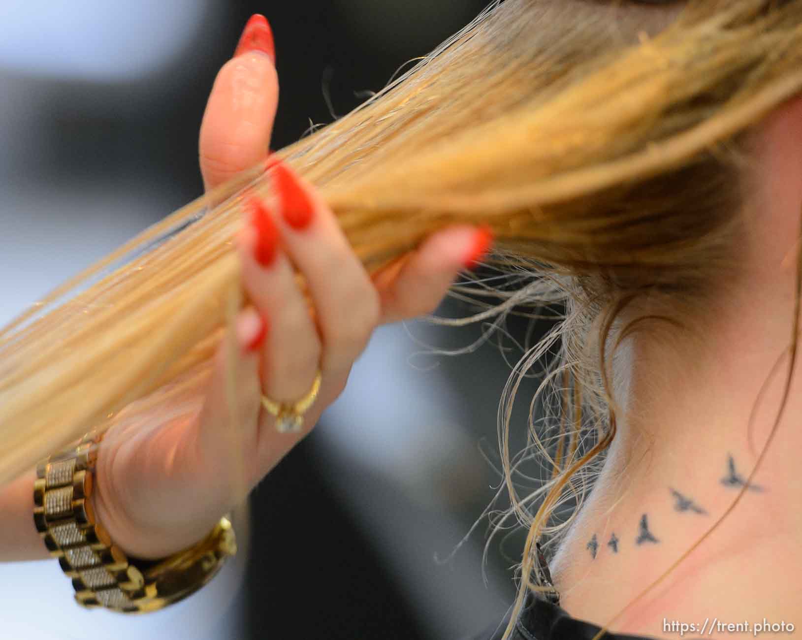 LaDonna Young, who left the polygamous the Kingston Group (also known as the Davis County Cooperative Society and the Latter Day Church of Christ) at the end of 2016, has her hair cut and styled by Amanda Moncur at Kelly Cardenas Salon in South Jordan, Tuesday January 9, 2018. The salon tries to help people leaving polygamous sects by offering them haircuts. For some, it's the first time they've been free to express themselves with a haircut.