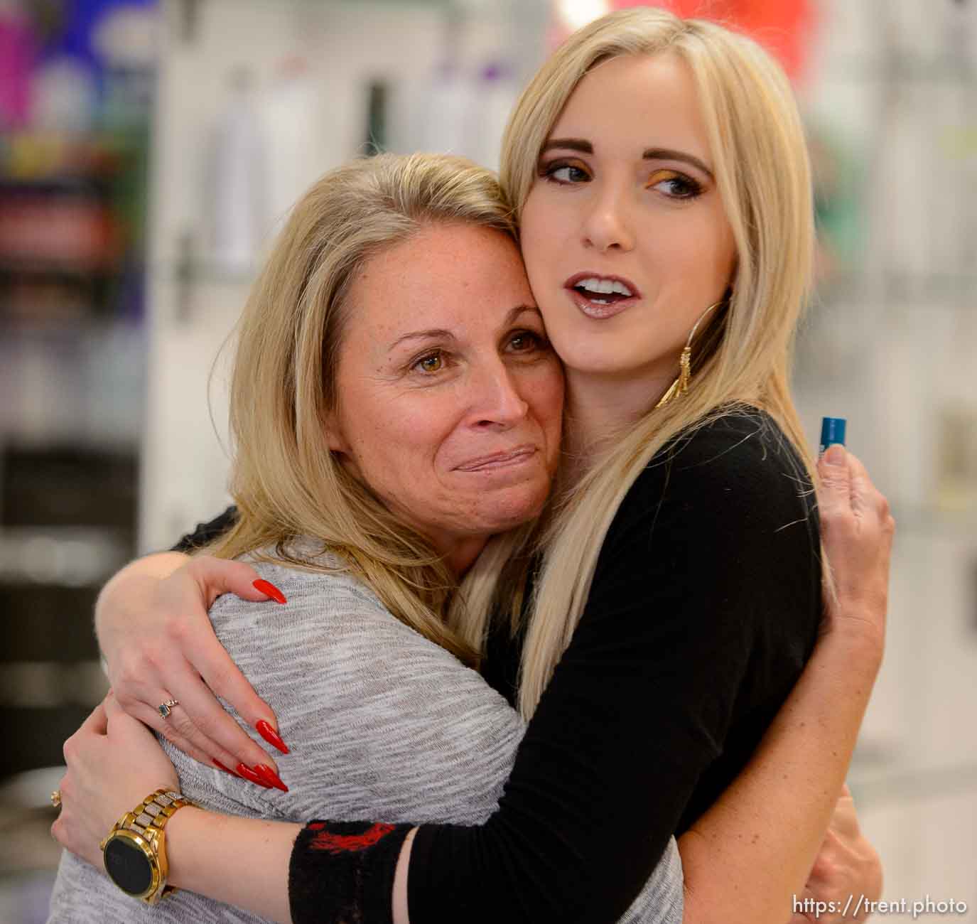 Tonia Tewell, Executive Director at Holding Out Help, embraces Amanda Moncur at Kelly Cardenas Salon in South Jordan, Tuesday January 9, 2018. The salon tries to help people leaving polygamous sects by offering them haircuts. For some, it's the first time they've been free to express themselves with a haircut.