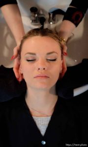 (Trent Nelson | The Salt Lake Tribune)  LaDonna Young, who left the polygamous the Kingston Group (also known as the Davis County Cooperative Society and the Latter Day Church of Christ) at the end of 2016, is massaged by Amanda Moncur at Kelly Cardenas Salon in South Jordan, Tuesday January 9, 2018. The salon tries to help people leaving polygamous sects by offering them haircuts. For some, it's the first time they've been free to express themselves with a haircut.