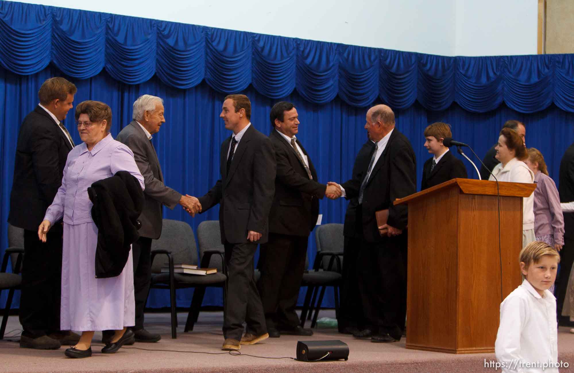 Trent Nelson  |  The Salt Lake Tribune
Congregants cross the stage shaking hands with church leaders following a church service of ex-FLDS members Sunday, February 17, 2013 in Hildale.