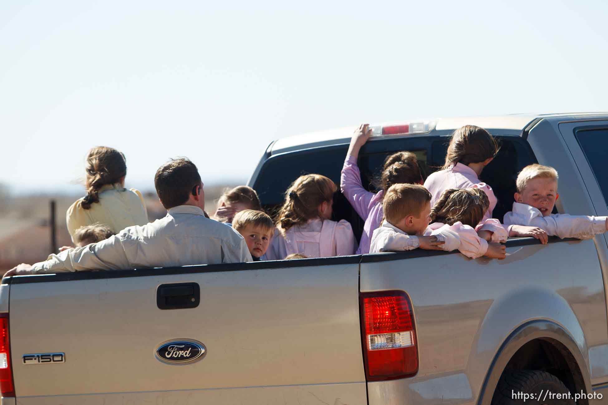 Trent Nelson  |  The Salt Lake Tribune
kids in back of truck Sunday, February 17, 2013 in Hildale.