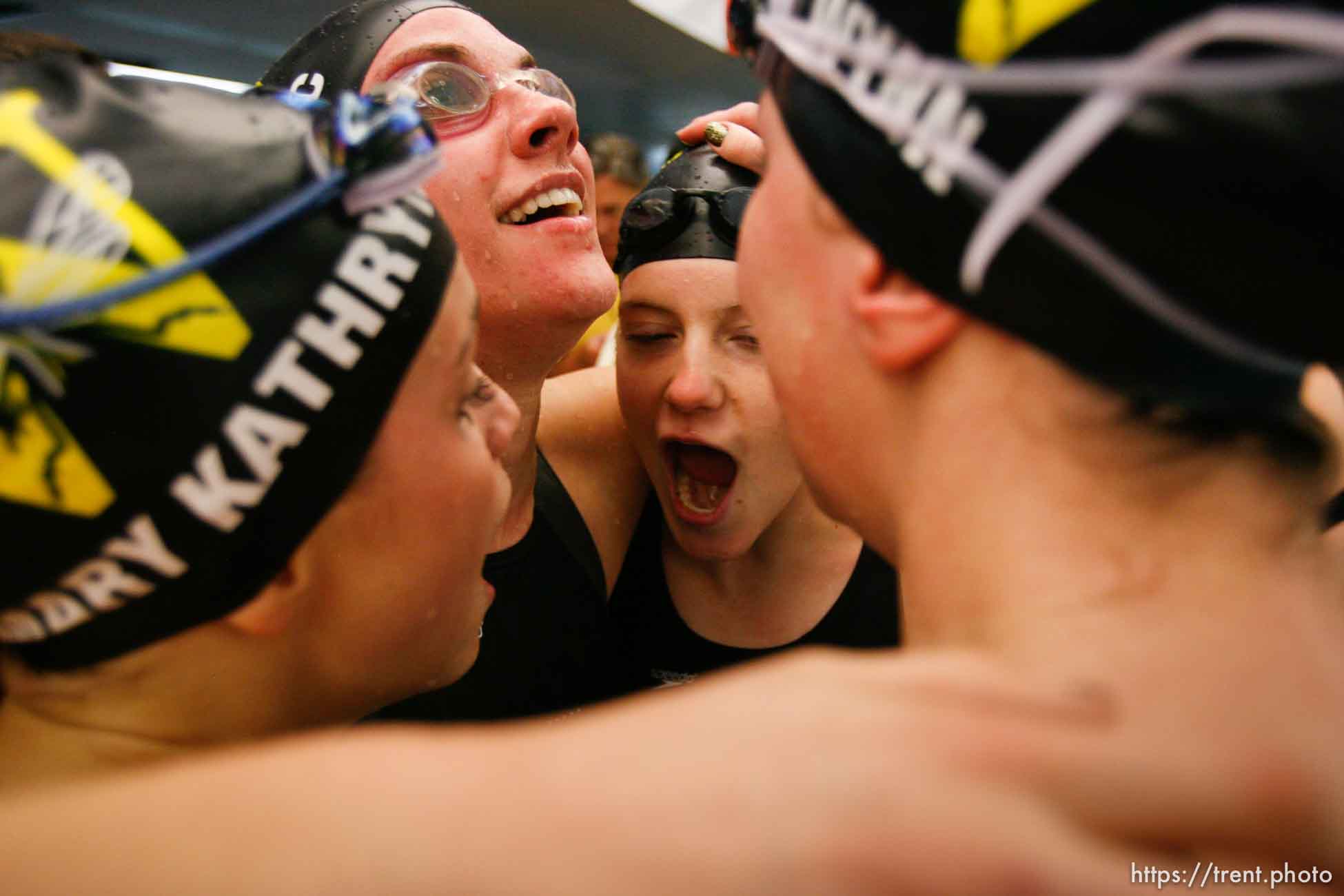 Provo - 3A State Championship High School Swim Meet. Saturday, February 7, 2009.; 02.07.2009. Celebrating their win in the Womens 200 Yard Freestyle Relay are (left to right) Wasatch High School's Mary Kathryn Brown, Veronica Hunsaker, Kristen Anderson and Erin Wynn