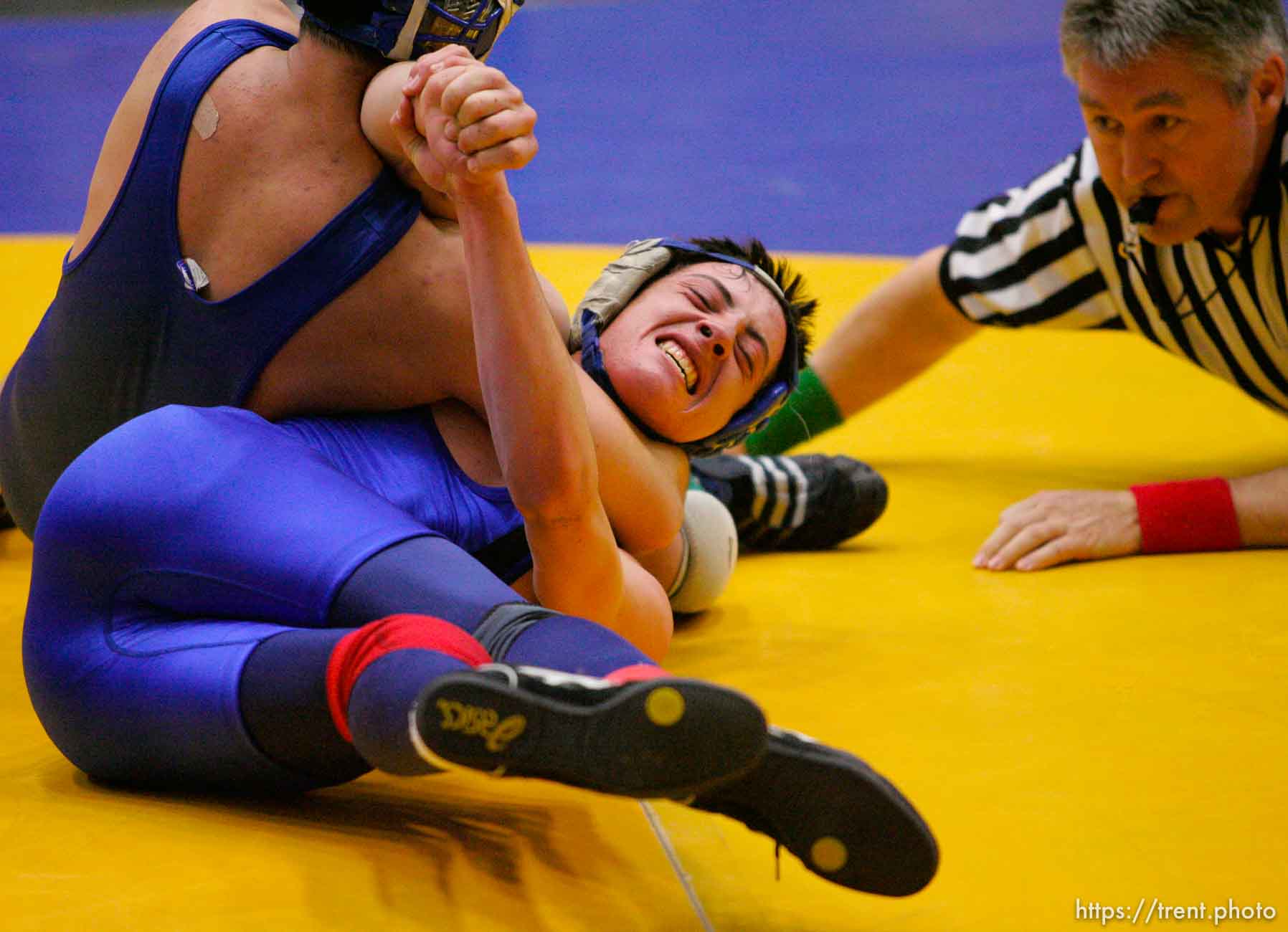 Carbon's Dallen McFarlane defeats Dixie's Bradee Hughes, 145lb. 3A high school wrestling quarterfinals at Utah State Valley College.
2.10.2005