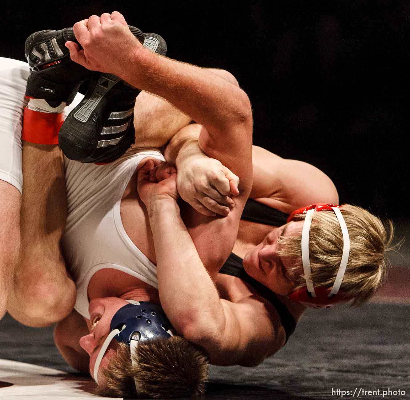 Trent Nelson  |  The Salt Lake Tribune
Aaron Kuttler of East, right, grapples with Joseph Carley of Mountain Crest in the 189lb championship match of the 4A State Wrestling Championships at Utah Valley University in Orem, Utah, Thursday, February 10, 2011. Kuttler won the match.