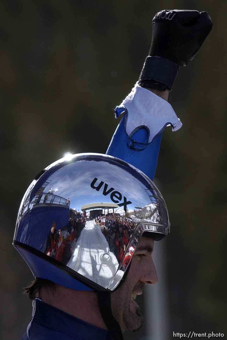 The luge track is reflected in Italian luger Armin Zoeggeler's helmet after he won the gold medal in Mens Luge, Monday morning at the Utah Olympic Park, 2002 Olympic Winter Games.
Photo by Trent Nelson 02.11.2002, 1:02:00 PM