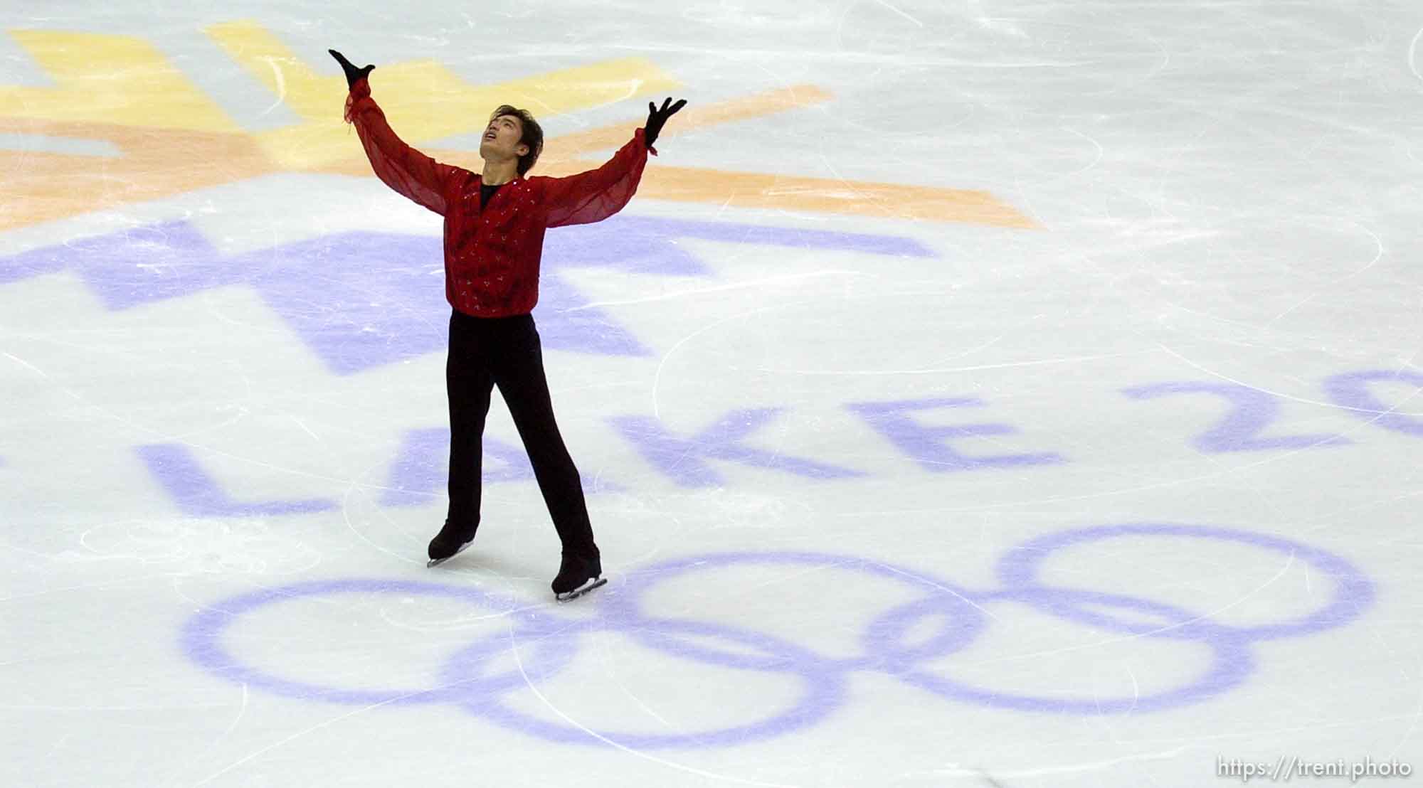 China's Min Zhang in the Men's Free Skating Finals competition Thursday evening at the Salt Lake Ice Center, 2002 Olympic Winter Games.
 02.14.2002, 6:26:10 PM