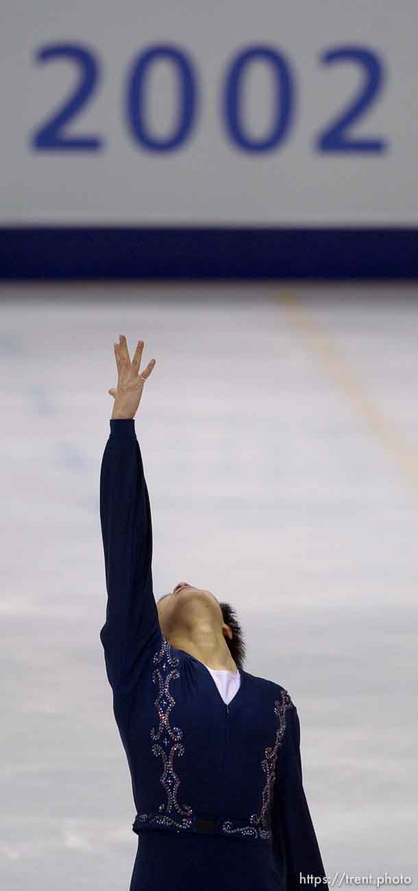 10. China's Yunfei Li in the Men's Free Skating Finals competition Thursday evening at the Salt Lake Ice Center, 2002 Olympic Winter Games.
 02.14.2002, 7:19:17 PM