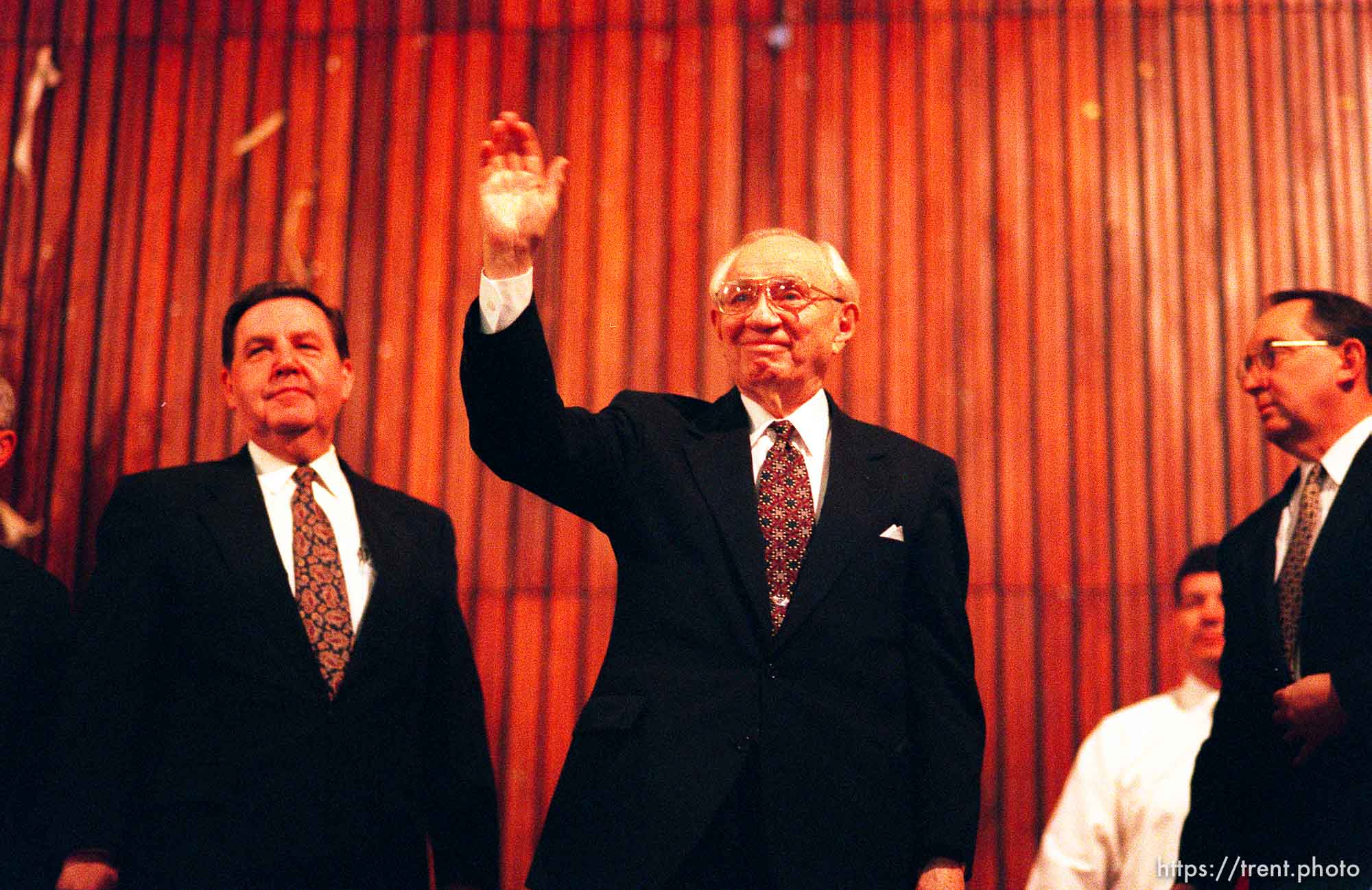 LDS President Gordon B. Hinckley waves after a meeting in the Zuna PF Building.