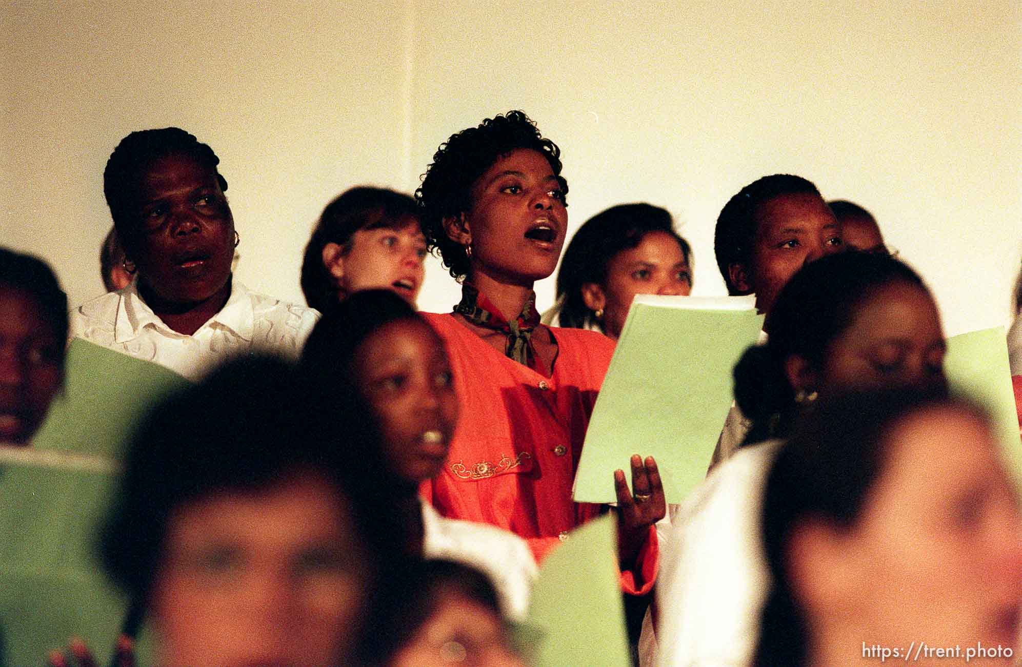 Choir sings at a meeting where LDS president Gordon B. Hinckley spoke.