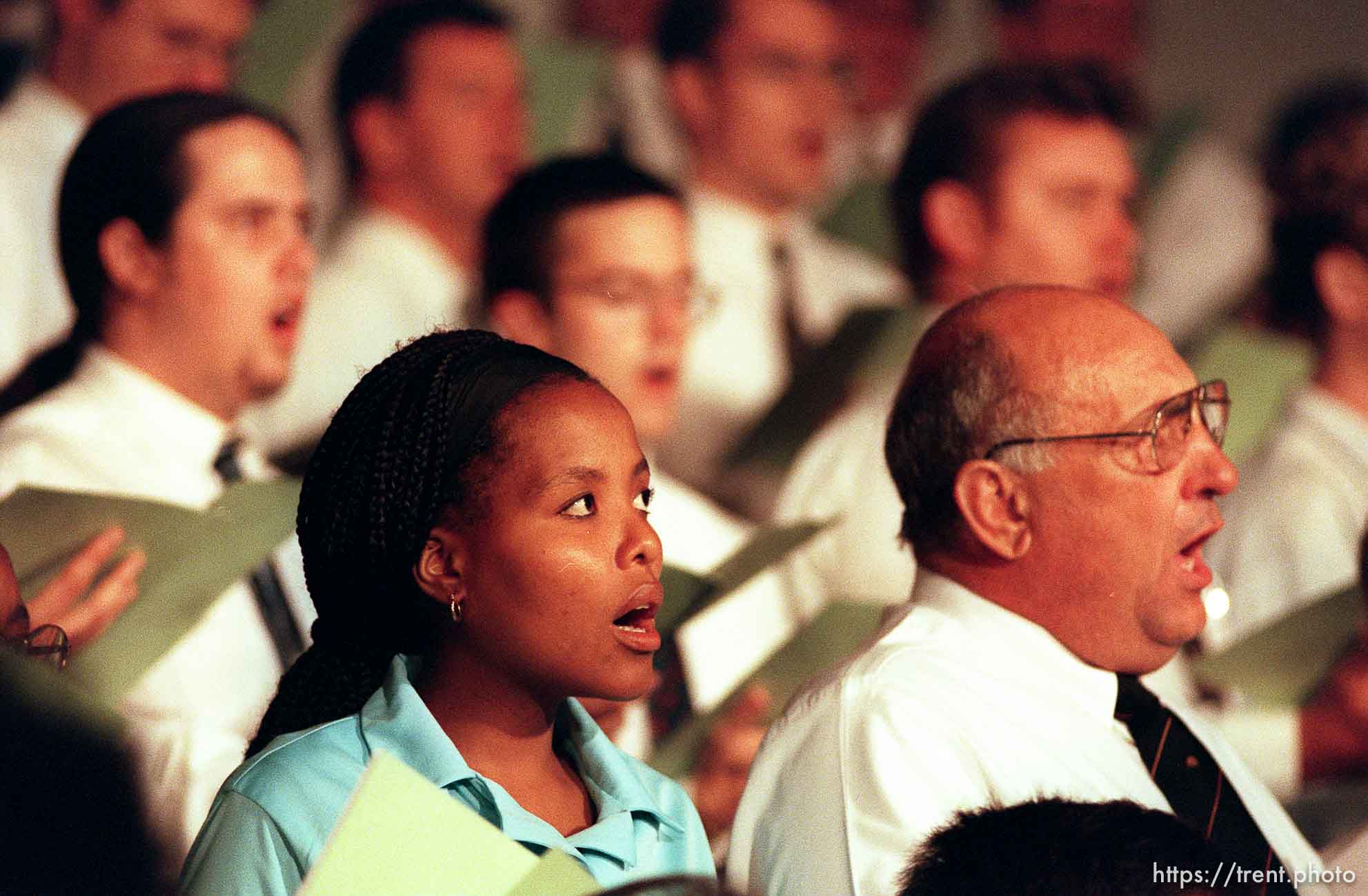 Choir sings at a meeting where LDS president Gordon B. Hinckley spoke.