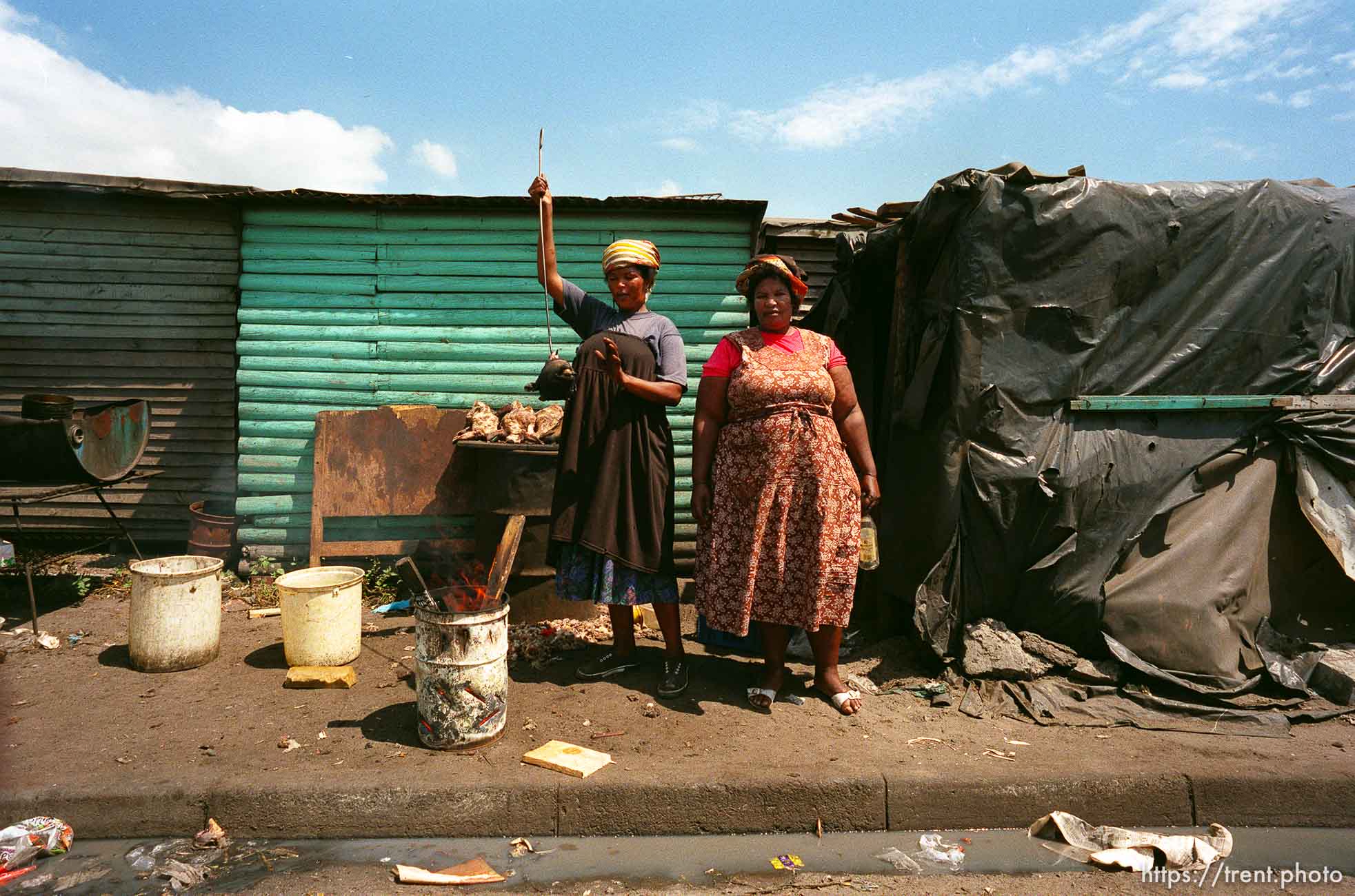 Woman selling cooked sheep heads.