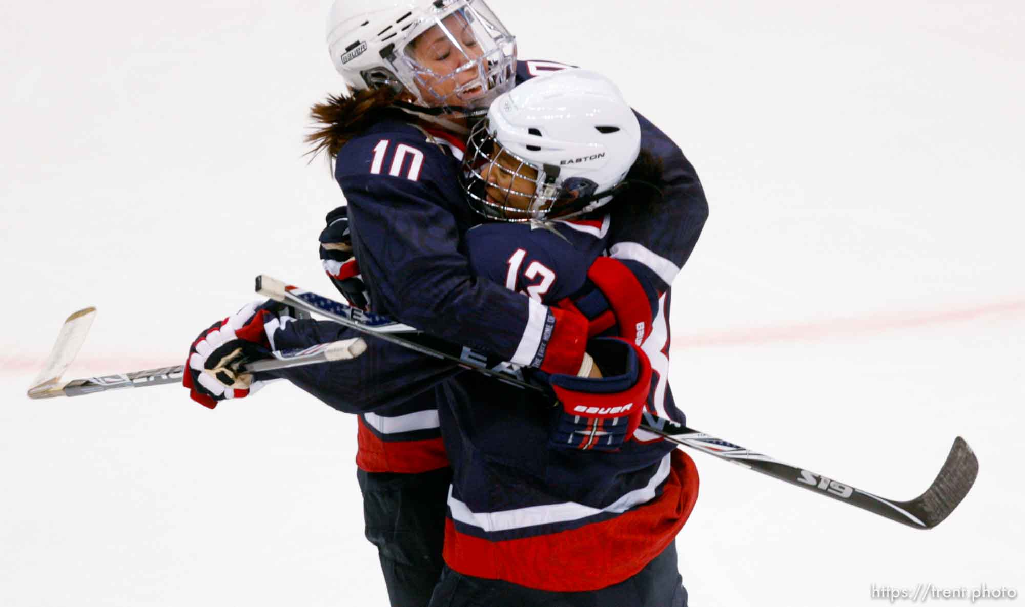 USA's Meghan Duggan (left) and USA's Julie Chu celebrate Duggan's first period goal that put USA up 2-0. USA vs. Sweden, women's hockey, at the XXI Olympic Winter Games in Vancouver, Monday, February 22, 2010.