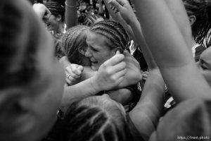 Bingham's Stephanie Sampson (center) in the midst of Bingham's championship celebration. Taylorsville - Bingham wins the state championship. Bingham vs. Skyline High School, 5A Girls State Basketball Championship game at Salt Lake Community College.