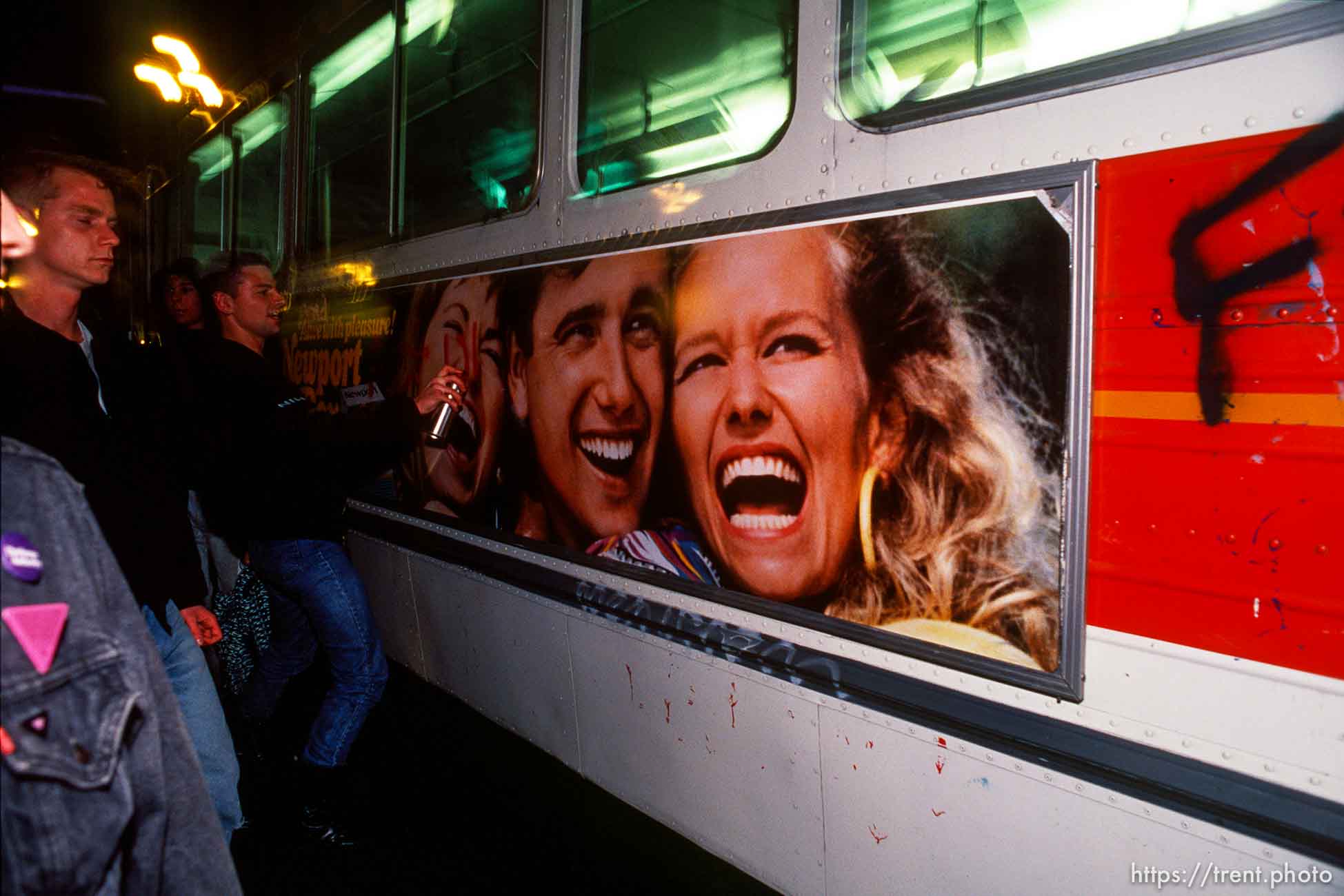 Spray painting a MUNI bus during Anti-war Gulf War protests.   p