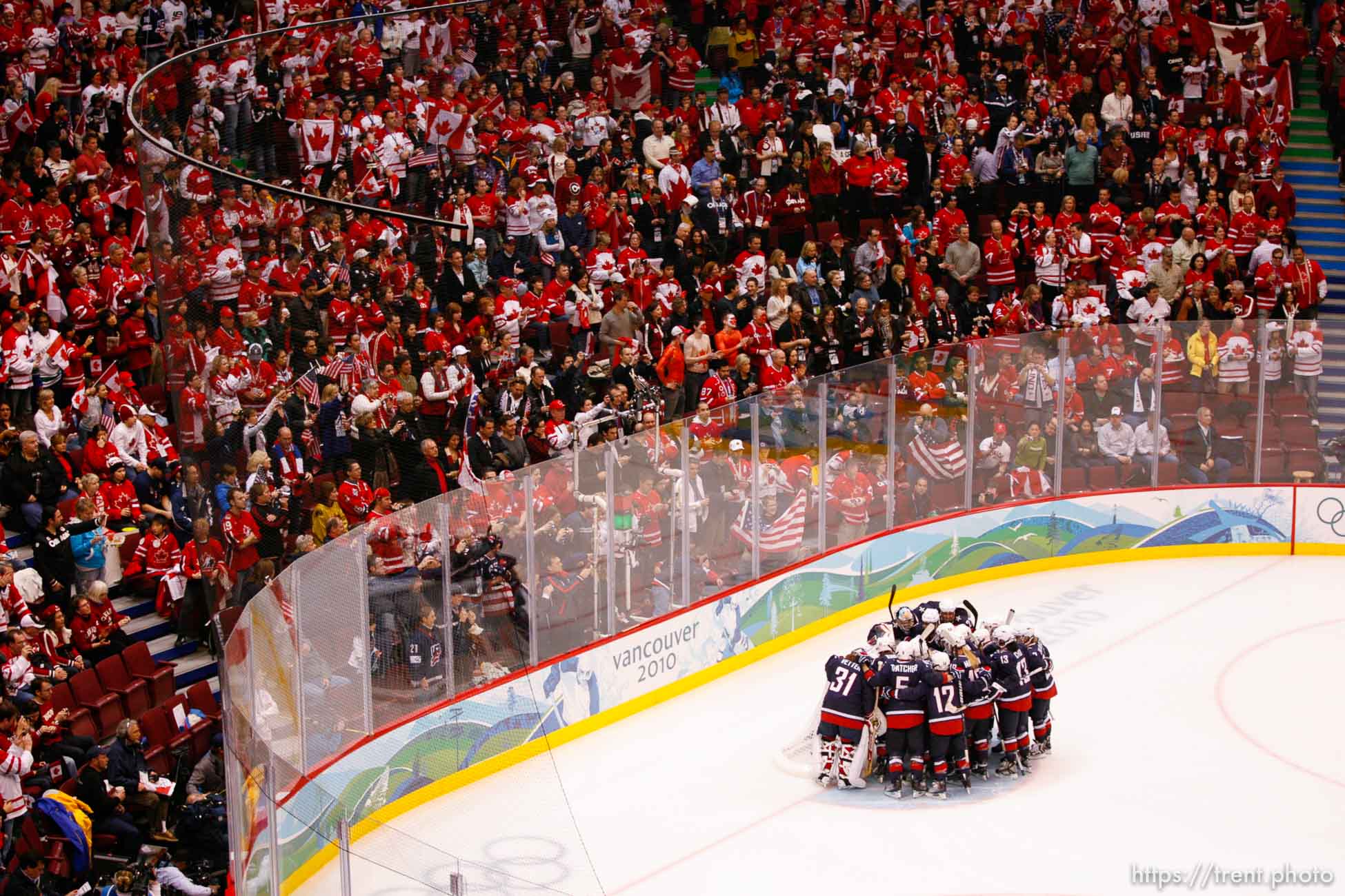 Trent Nelson  |  The Salt Lake Tribune
Team USA huddles before a Canadian crowd prior to the game. USA vs. Canada, gold medal game, women's Ice Hockey at the Canada Hockey Place, Vancouver, XXI Olympic Winter Games, Thursday, February 25, 2010.