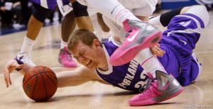 Trent Nelson  |  The Salt Lake Tribune
Portland forward Ryan Nicholas (32) dives for a loose ball. BYU vs. Portland, college basketball Saturday, February 25, 2012 in Provo, Utah.