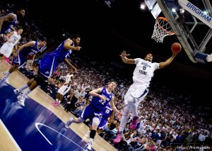 Trent Nelson  |  The Salt Lake Tribune
BYU forward Brandon Davies (0) dunks the ball. BYU vs. Portland, college basketball Saturday, February 25, 2012 in Provo, Utah.