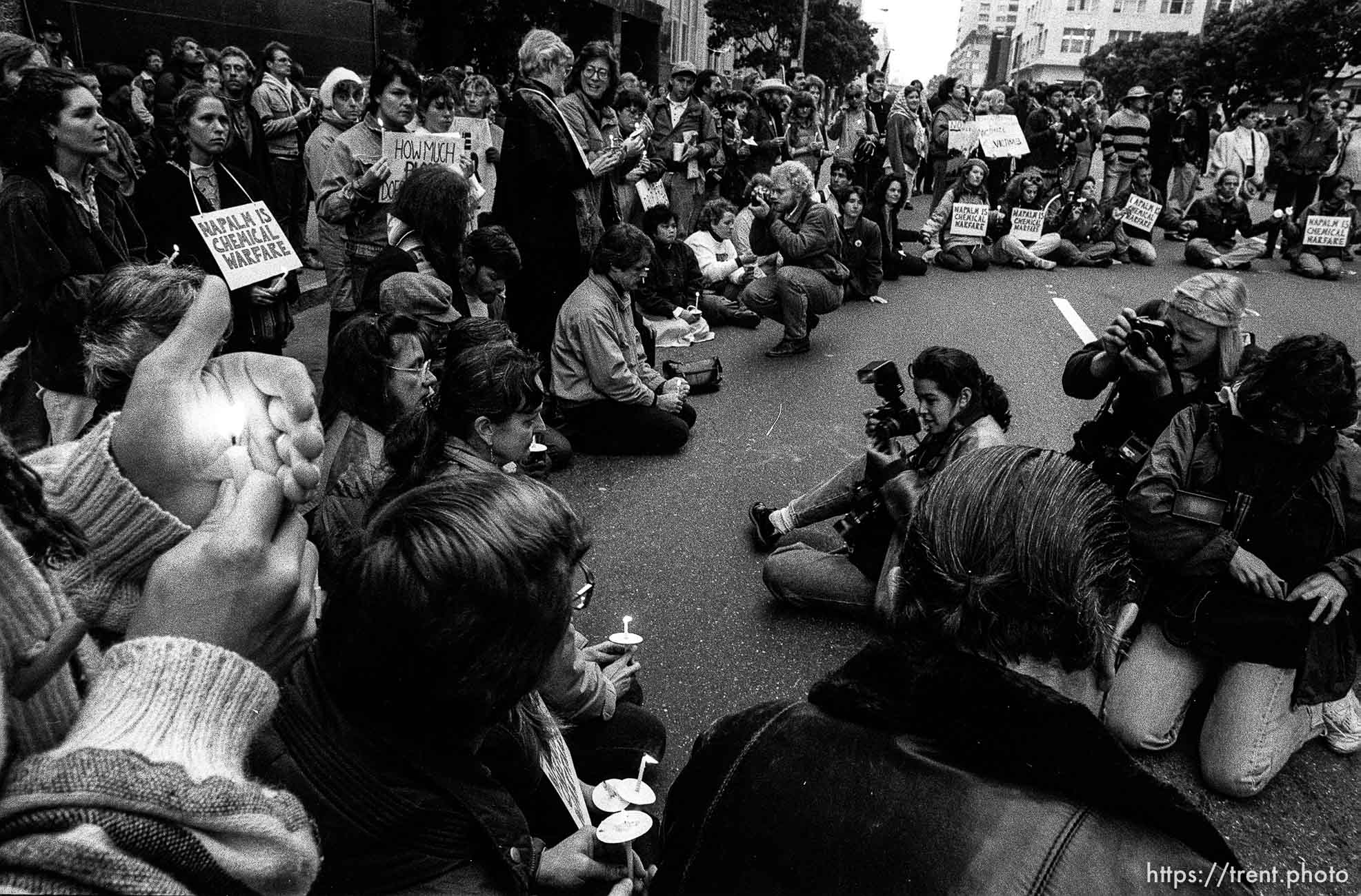 Candles and news photographers (jason grow) at Gulf War protest Federal Building blockade