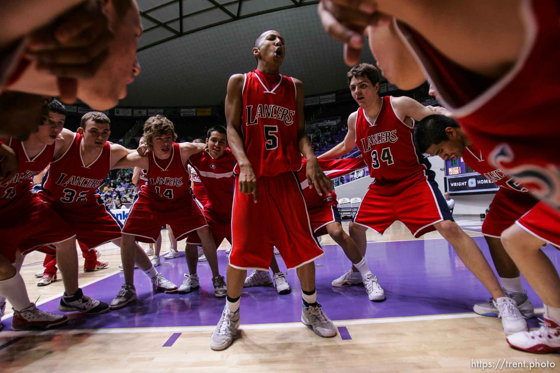 granger's Tre Musgrow in the middle of the pre-game huddle. Ogden - Provo vs. Granger High School boys basketball, 4A State Basketball Championships at the Dee Events Center Wednesday.