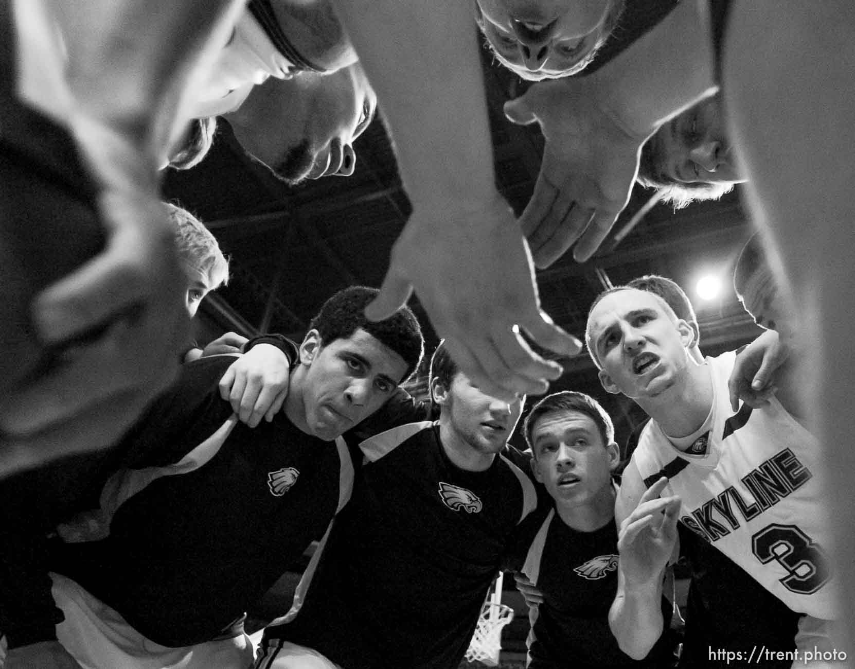 Skyline's Clint Berhow (3) gets his team pumped up in a pre-game huddle. Orem vs. Skyline, 4A High School Basketball Championships Wednesday, February 29, 2012 at the Maverik Center in West Valley City, Utah.