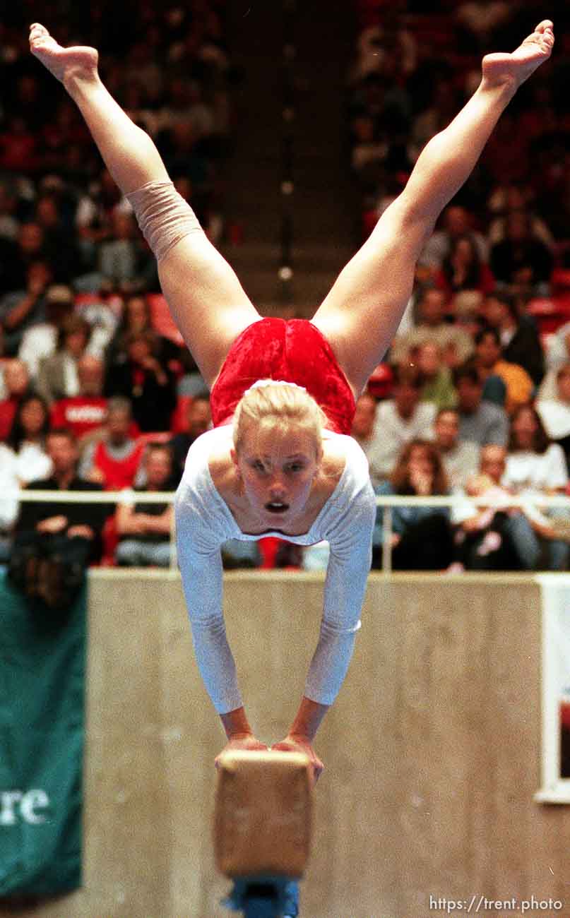 Traci Sommer on the beam at BYU vs. Utah gymnastics.