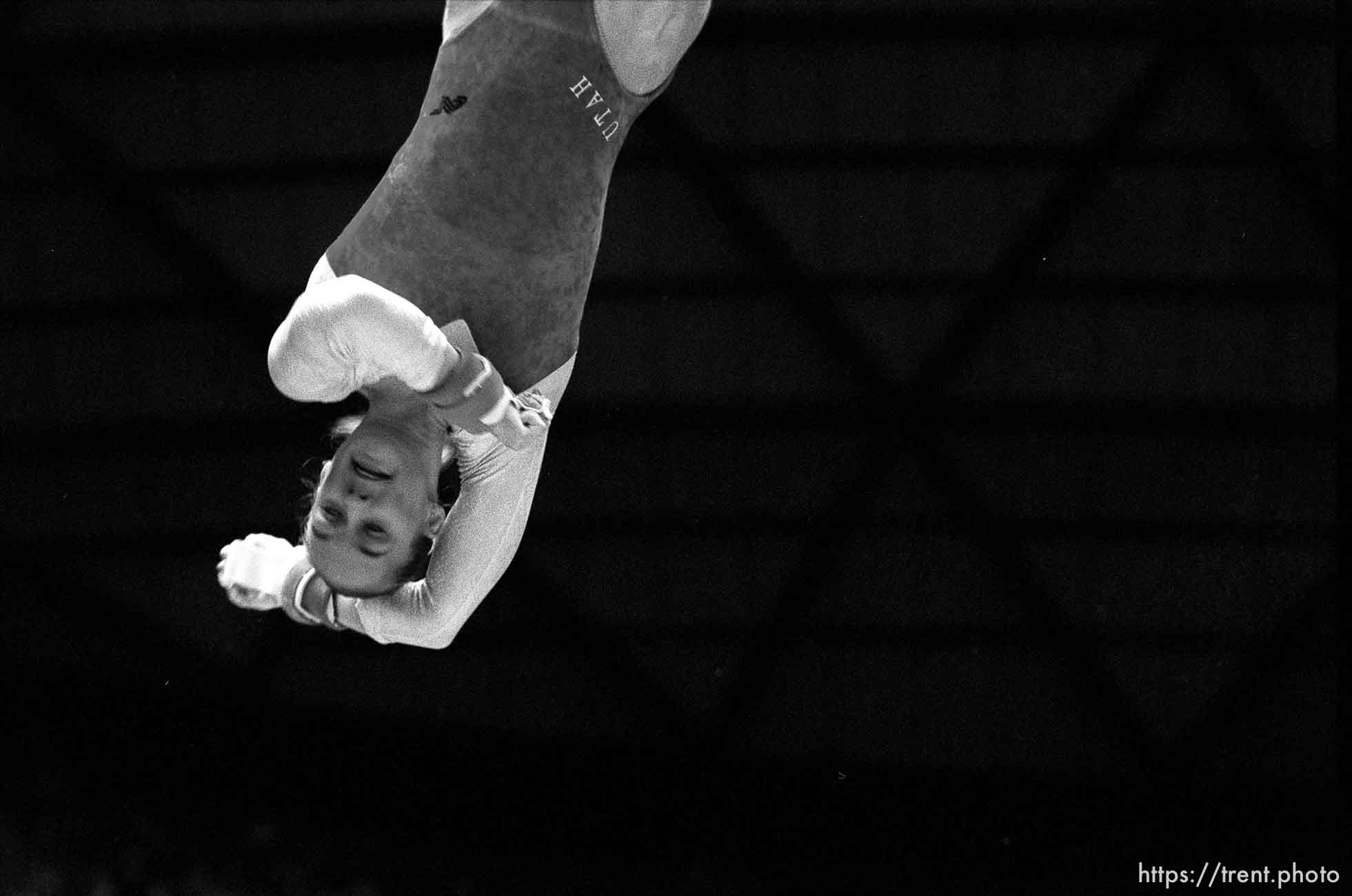 Utah's Molly Northrop dismounts from the bars at BYU vs. Utah gymnastics.