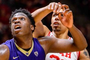 Trent Nelson  |  The Salt Lake Tribune
Washington Huskies forward Noah Dickerson (15) and Utah Utes forward Jordan Loveridge (21) battle after a free throw, as the University of Utah Utes host the Washington Huskies, NCAA basketball at the Huntsman Center in Salt Lake City, Wednesday February 10, 2016.